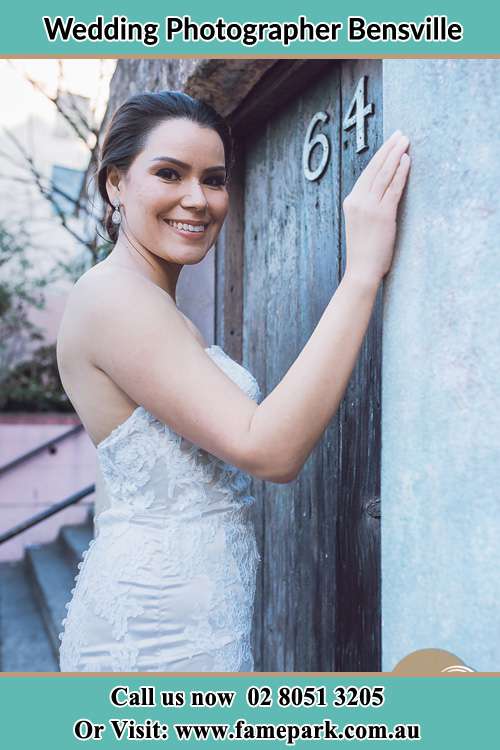 The Bride smiling at the front door Bensville