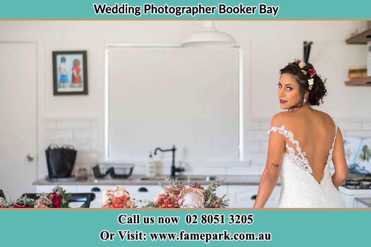 The Bride looked back to pose for the camera Largs Booker Bay