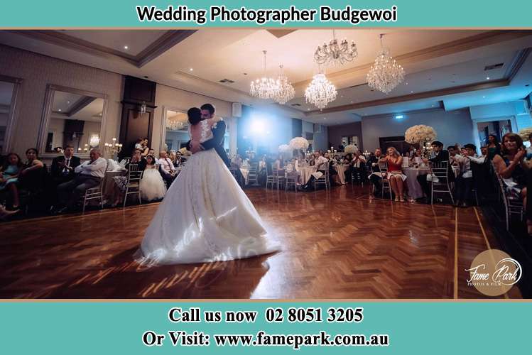 Photo of the Bride and the Groom hugging at the dance floor Budgewoi NSW 2262