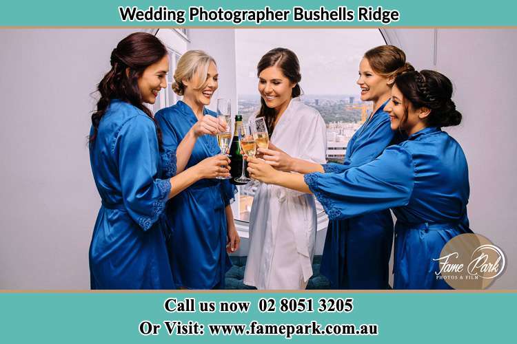 Photo of the Bride and the bridesmaids drinking wine Bushells Ridge NSW 2259