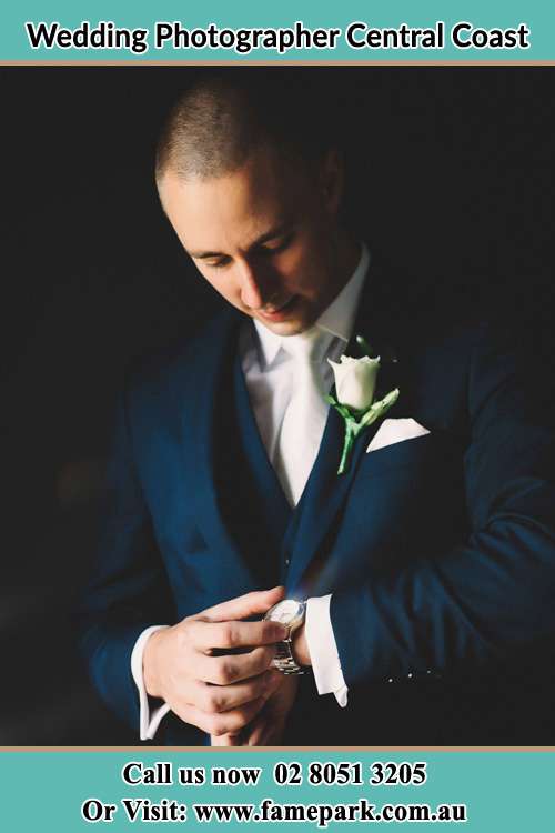 The Groom checking the time Central Coast