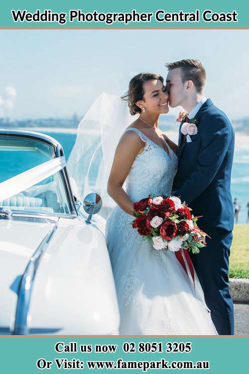 Groom kiss the Bride in the car Central Coast