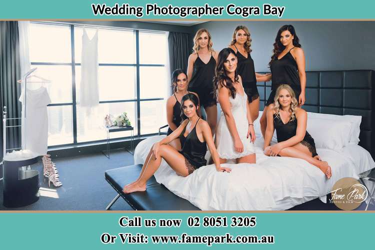 The Bride and her bridesmaids posing for the camera Cogra Bay