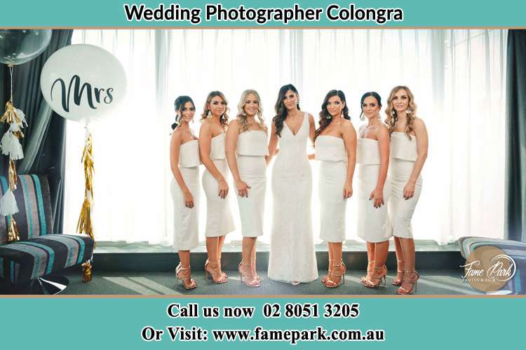 The Bride and her bridesmaids posed for the camera Colongra