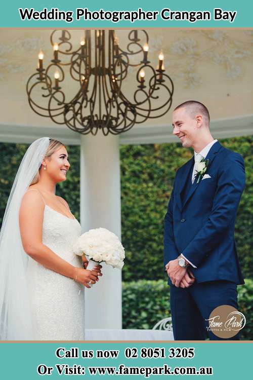 The Groom and the Bride happily looking at each other Crangan Bay