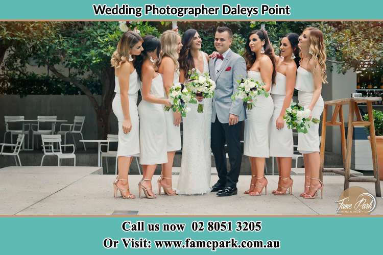 Photo of the Groom and Bride with their bridesmaids Daleys Point