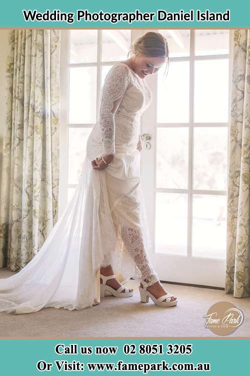 Photo of the Bride checking her shoe Daniel Island NSW 29492