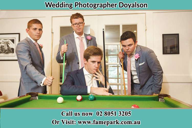 The Groom and his groomsmen playing billiards Doyalson