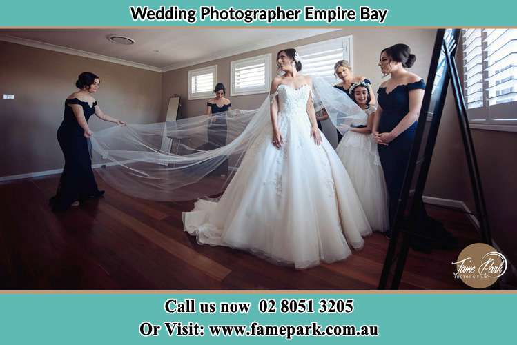 Photo of the Bride in Gown preparation Empire Bay