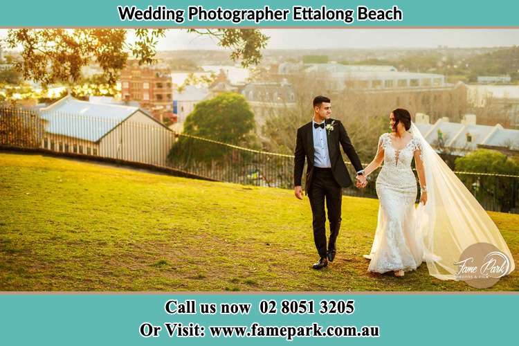 Bride and Groom walking in the yard Ettalong Beach