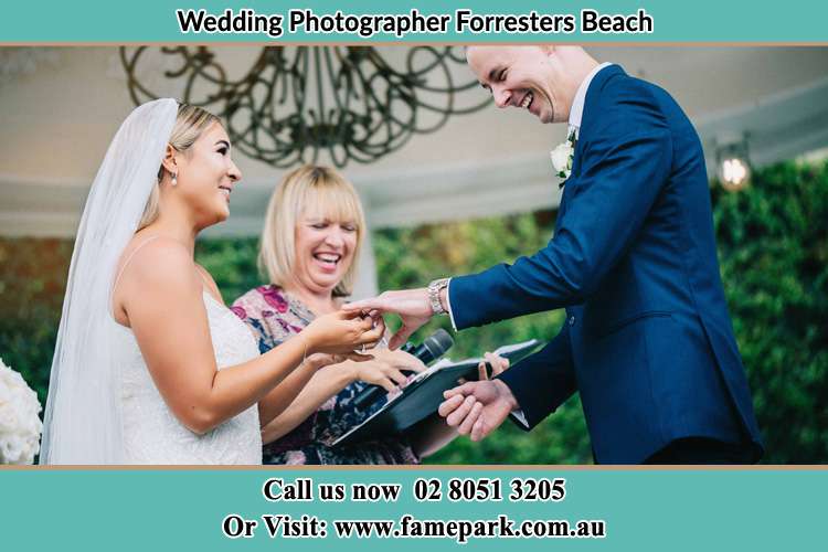 Photo of the bride wearing ring to the Groom Forresters Beach NSW 2260