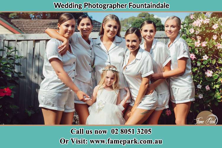 The Bride and her bridesmaids posing for the camera Fountaindale