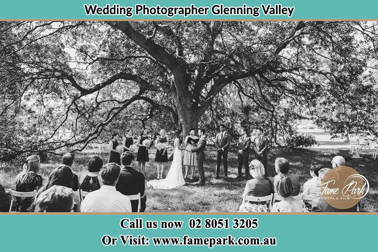 Wedding ceremony under the big tree photo Glenning Valley NSW 2261