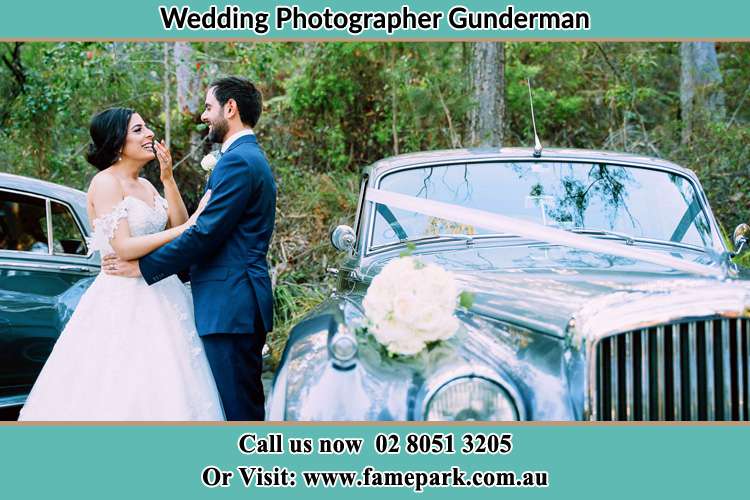 Photo of the Bride and the Groom besides the bridal car Gunderman NSW 2775