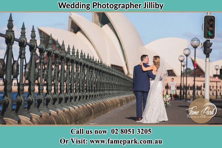 The Groom and the Bride walking towards the Sydney Grand Opera House Jilliby NSW 2259