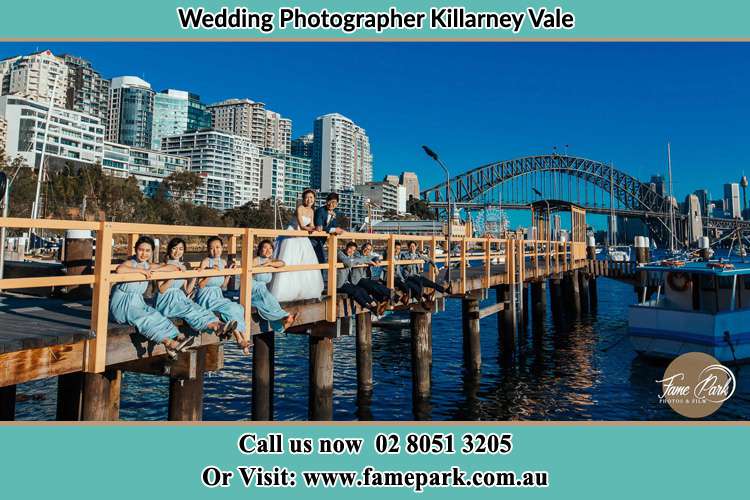 Photo of the Groom and the Bride with the entourage at the bridge Killarney Vale NSW 2261