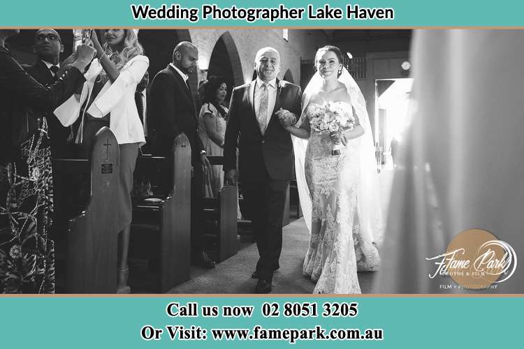 Photo of the Bride with her father walking the aisle Lake Haven NSW 2263