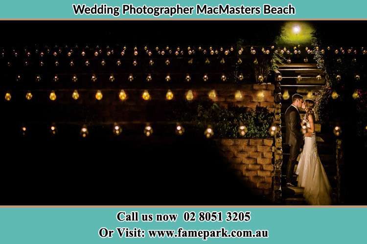 Photo of the Groom and the Bride kissing MacMasters Beach NSW 2251