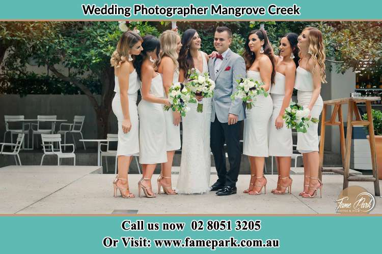 Photo of the Bride and the Groom with the bridesmaids Mangrove Creek NSW 2250