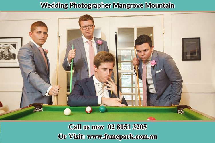 Photo of the Groom and the groomsmen playing billiard Mangrove Mountain NSW 2250