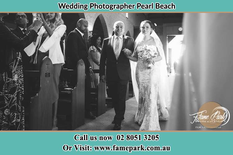 Photo of the Bride with her father walking the aisle Pearl Beach NSW 2256