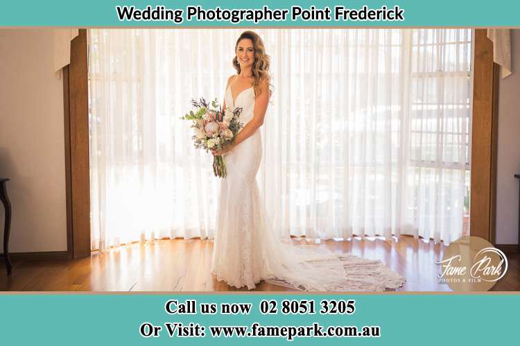 Photo of the Bride holding flower bouquet Point Frederick NSW 2250