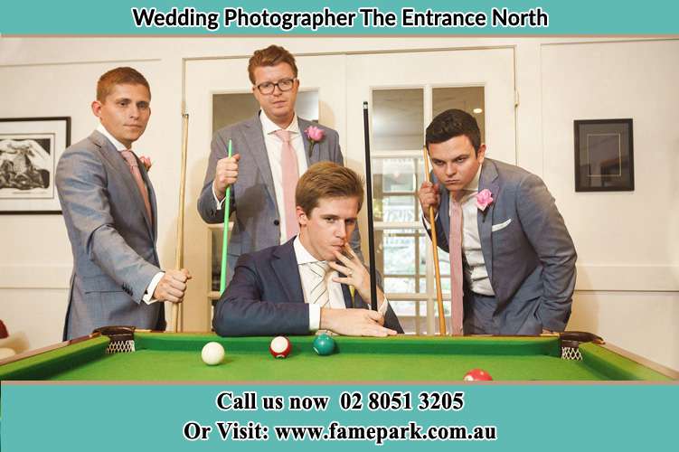 Photo of the Groom and the groomsmen playing billiard The Entrance North NSW 2261