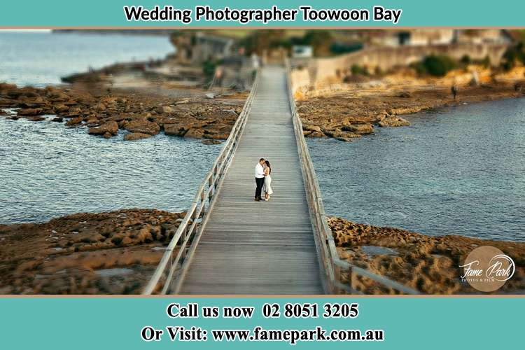 Photo of the Groom and the Bride at the bridge Toowoon Bay NSW 2261