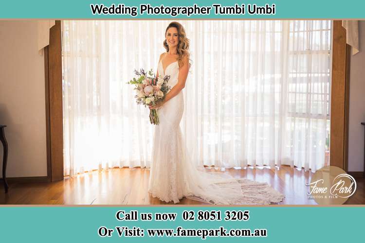 Photo of the Bride holding flower bouquet Tumbi Umbi NSW 2261