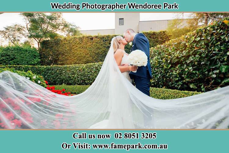 Photo of the Bride and the Groom kissing at the garden Wendoree Park NSW 2250